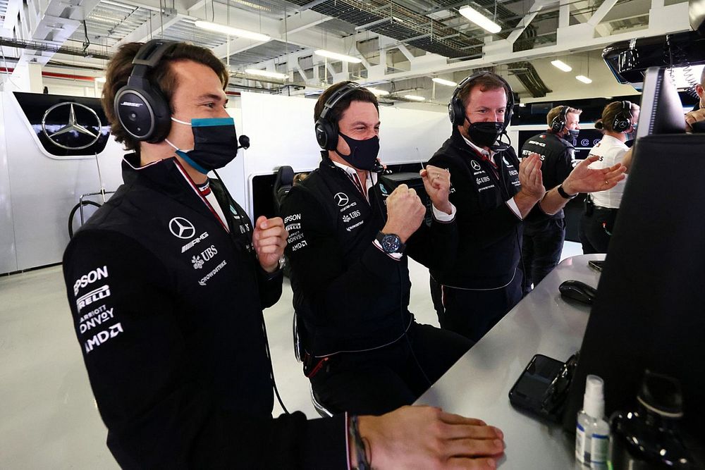 Nyck De Vries and Toto Wolff, Team Principal and CEO, Mercedes AMG, celebrate in the garage as Valtteri Bottas, Mercedes, takes pole