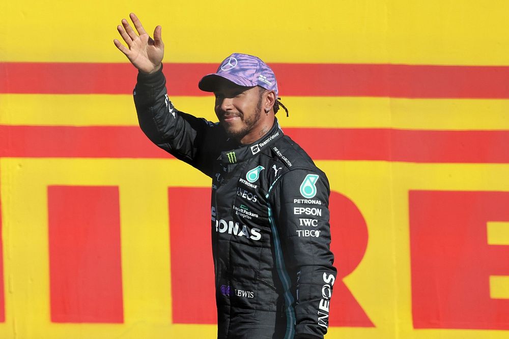 Lewis Hamilton, Mercedes, waves to fans