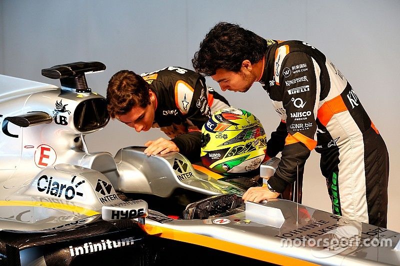 (L to R): Esteban Ocon, Sahara Force India F1 Team with Sergio Perez, Sahara Force India F1 and the Sahara Force India F1 VJM10