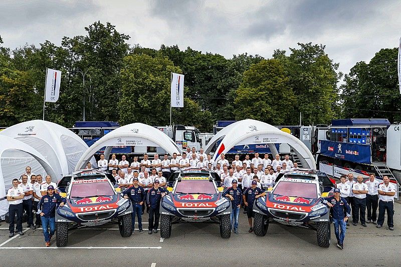 The starting pistol fires for Peugeot and Kamaz at Silk Way Rally