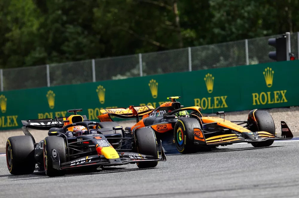 Max Verstappen, Red Bull Racing RB20, leads Lando Norris, McLaren MCL38