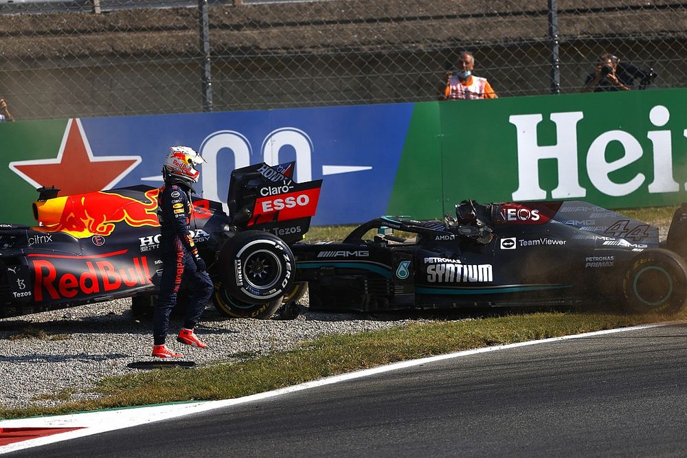 Max Verstappen, Red Bull Racing, walks away after crashing out with Lewis Hamilton, Mercedes