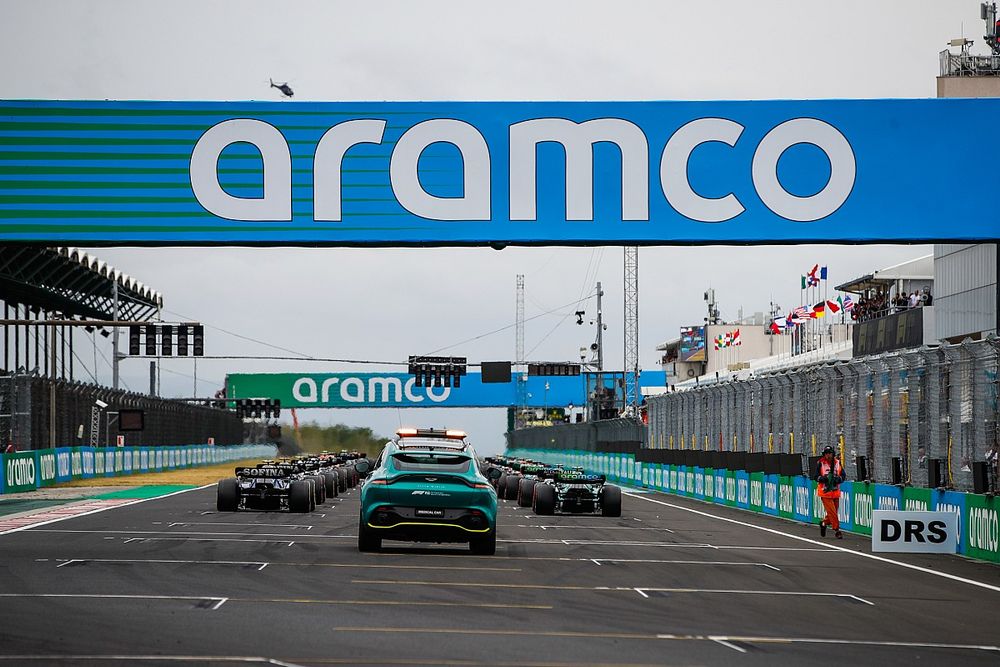 The Medical Car sits at the rear as the cars line up on the grid for the start of the race