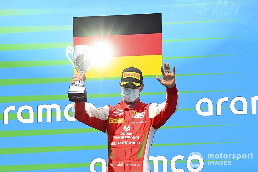 Mick Schumacher, Prema Racing celebrates on the podium with the trophy