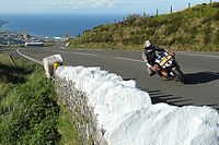 Isle of Man TT: Cummins tops Superbikes as bad weather relents