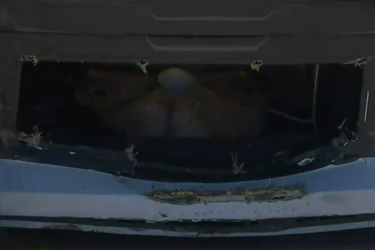 Metal cover comes up and tears through the nose of NASCAR O'Reilly car, stopping race
