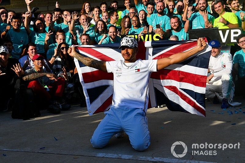 Lewis Hamilton, Mercedes AMG F1, 2nd position, celebrates with his team after securing his 6th drivers title