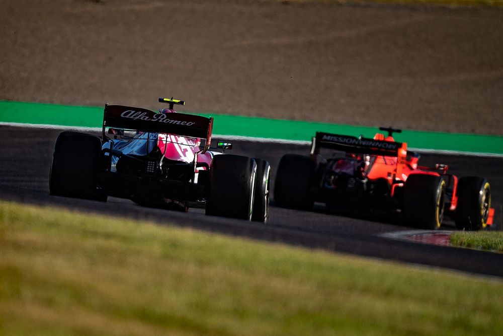 Sebastian Vettel, Ferrari SF90, leads Antonio Giovinazzi, Alfa Romeo Racing C38