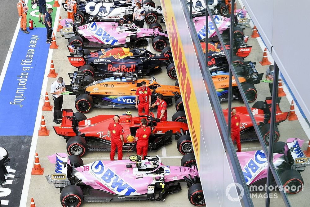 The cars of Lance Stroll, Racing Point RP20, Charles Leclerc, Ferrari SF1000, Lando Norris, McLaren MCL35, Max Verstappen, Red Bull Racing RB16, Nico Hulkenberg, Racing Point RP20, and Pierre Gasly, AlphaTauri AT01, in Parc Ferme