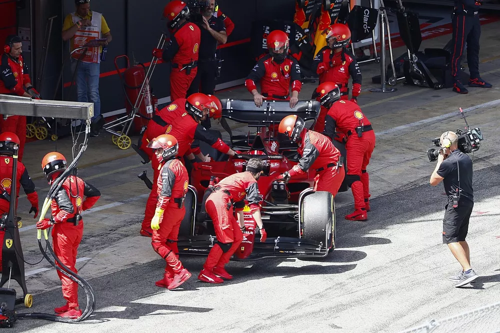 Charles Leclerc, Ferrari F1-75, is returned to the garage and retired from the race after leading 