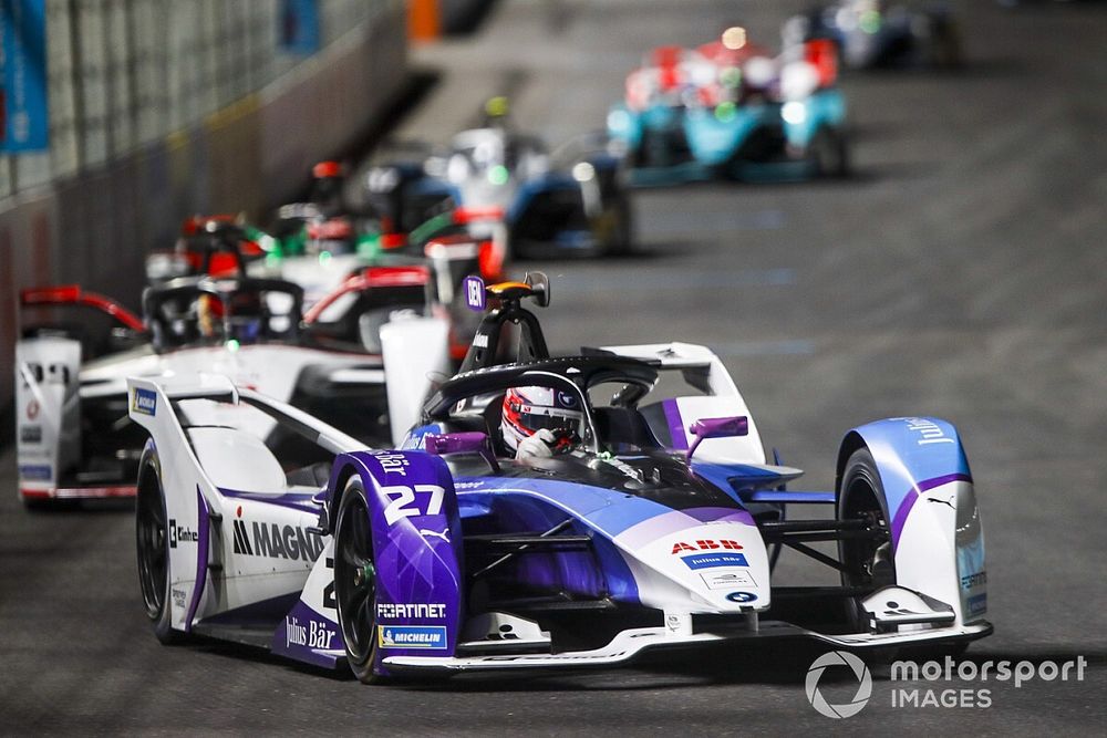 Jake Dennis, BMW I Andretti Motorsport, BMW iFE.21, leads Pascal Wehrlein, Tag Heuer Porsche, Porsche 99X Electric