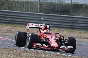 Vettel crashes during Pirelli's wet F1 tyre test