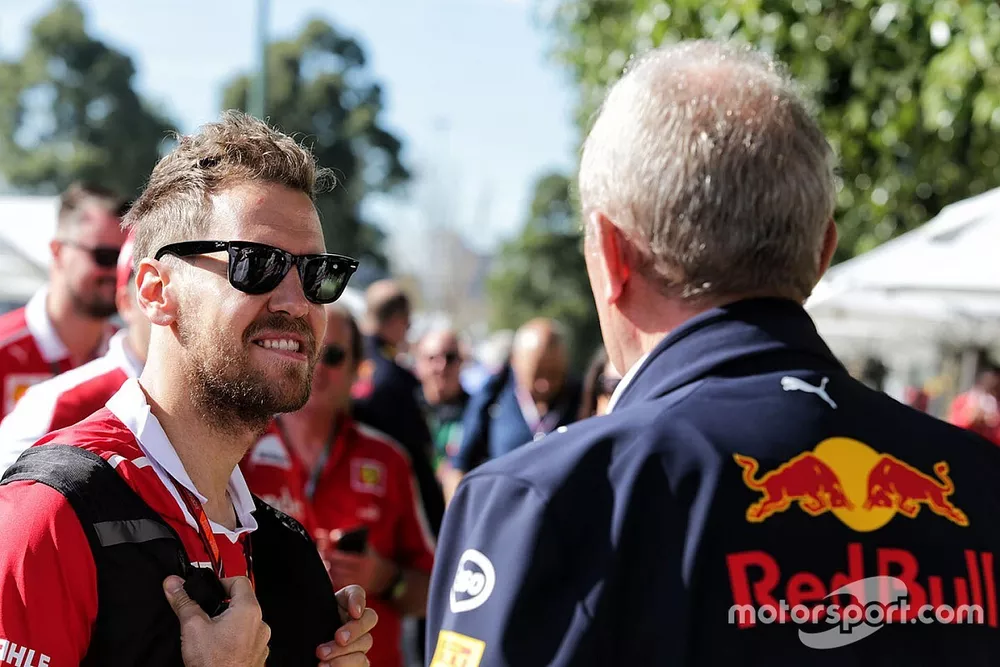 Sebastian Vettel, Ferrari con Dr Helmut Marko, Red Bull Motorsport Consultor