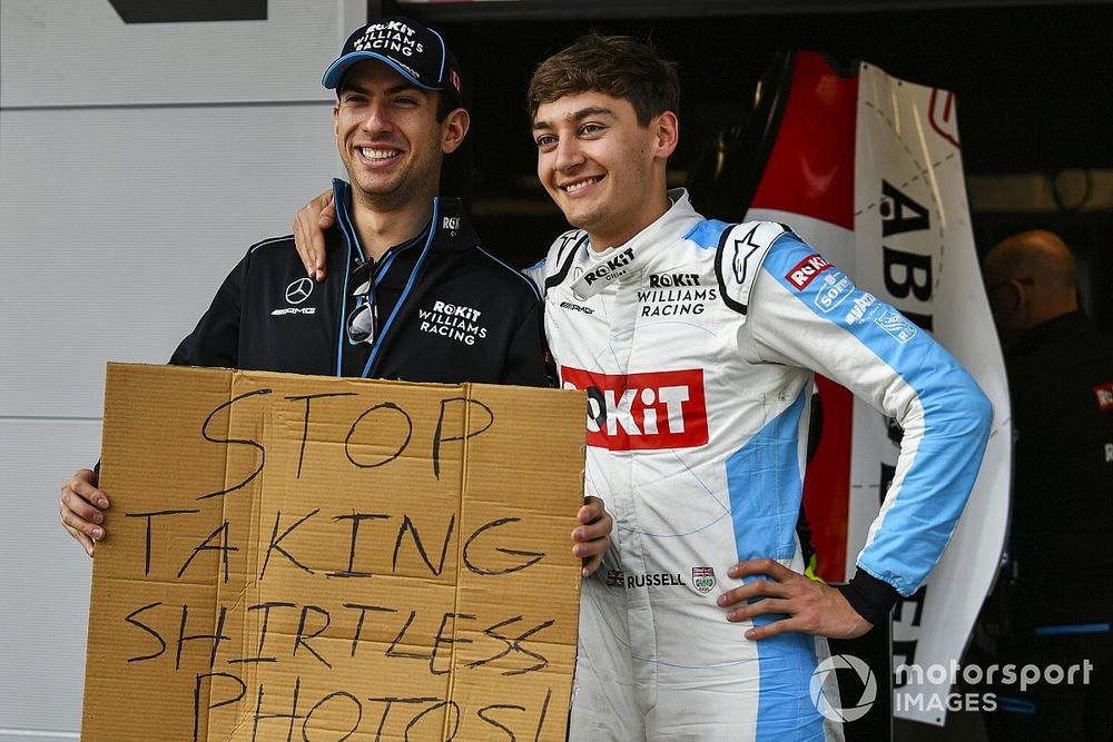Nicholas Latifi, Williams Racing, holds a message for George Russell, Williams Racing