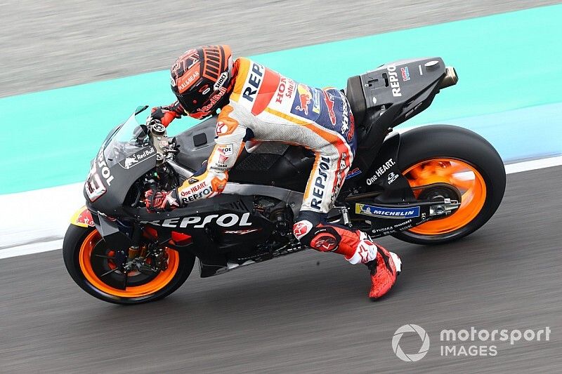 Marquez dislocated shoulder after crashing on damp patch