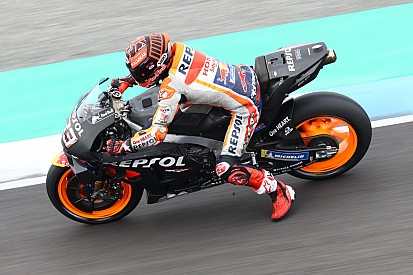 Marquez dislocated shoulder after crashing on damp patch