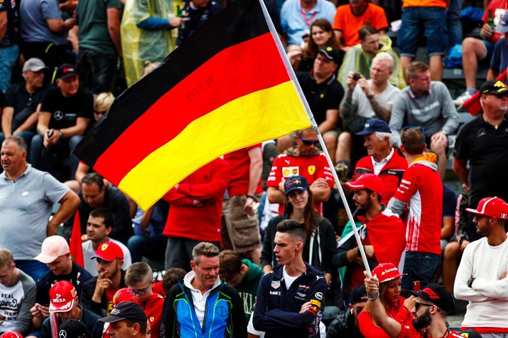 German flag flown by the tifosi for Sebastian Vettel, Ferrari 