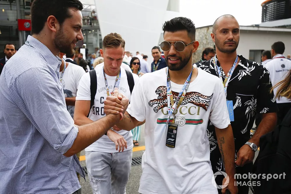 Sergio Aguero, professional footballer, arrives in the paddock