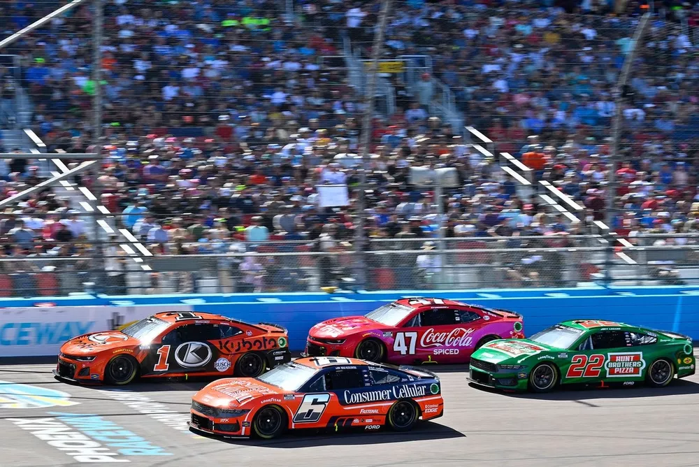 Brad Keselowski, RFK Racing, Consumer Cellular Ford Mustang, Ross Chastain, Trackhouse Racing, Kubota Chevrolet Camaro, Ricky Stenhouse Jr, JTG Daugherty Racing, Fry's/Coca-Cola Spiced Chevrolet Camaro, and Joey Logano, Team Penske, Hunt Brothers Pizza Ford Mustang