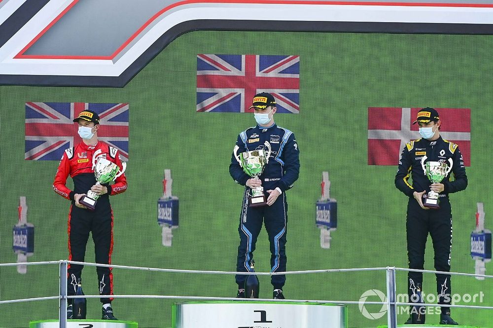 Callum Ilott, UNI-Virtuosi, Race Winner Dan Ticktum, Dams and Christian Lundgaard, ART Grand Prix on the podium with the trophy