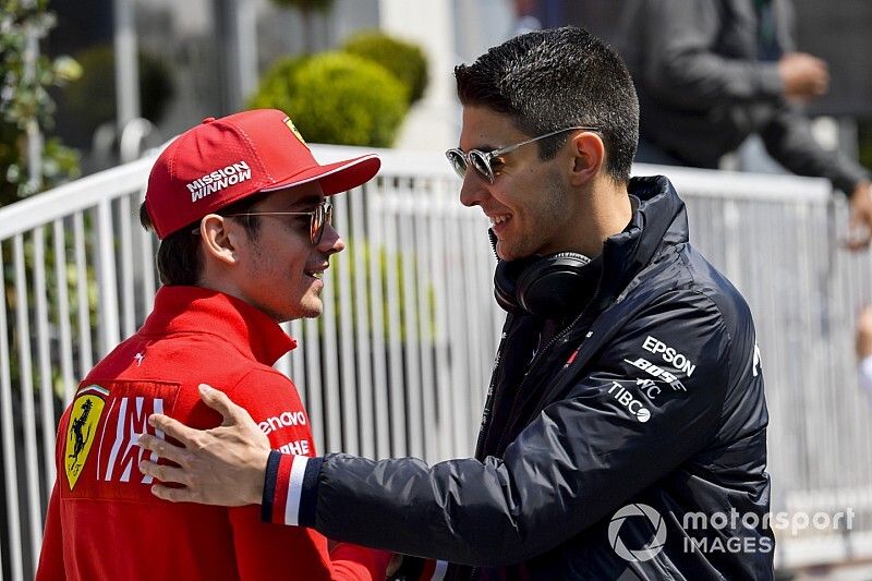 Charles Leclerc, Ferrari and Esteban Ocon, Mercedes AMG F1 in the paddock 