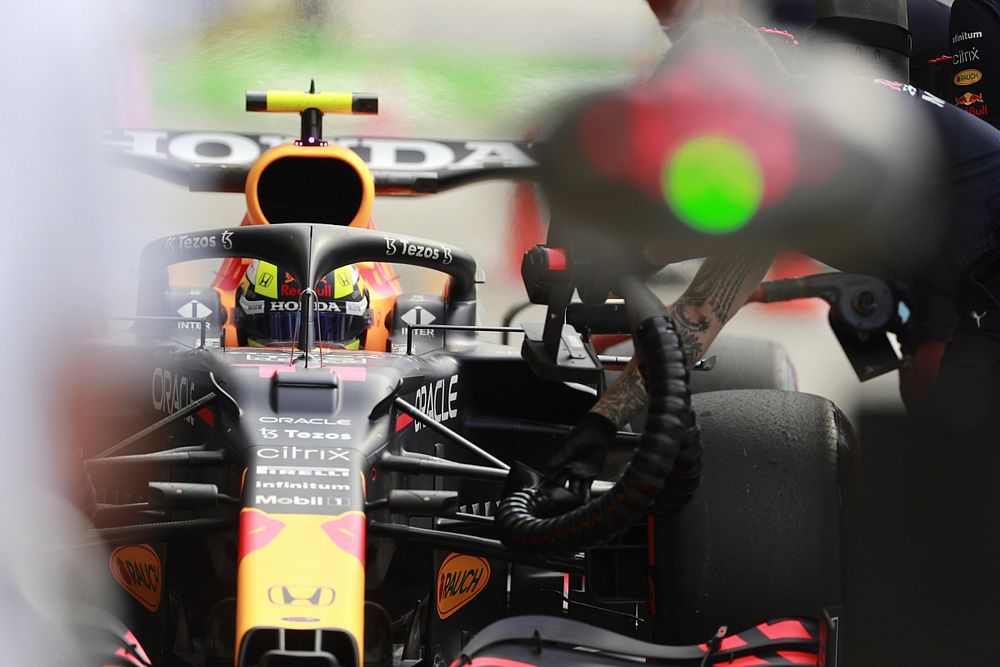 Sergio Perez, Red Bull Racing RB16B, in the pit lane