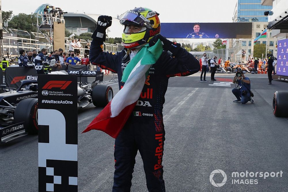 Sergio Perez, Red Bull Racing, 1st position, celebrates in Parc Ferme