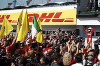 Tensão entre colegas e vitória de Vettel; as imagens do dia
