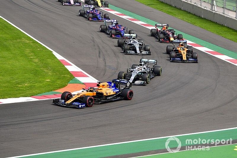 Carlos Sainz Jr., McLaren MCL34 leads Lewis Hamilton, Mercedes AMG F1 W10, Lando Norris, McLaren MCL34 and Valtteri Bottas, Mercedes AMG W10 