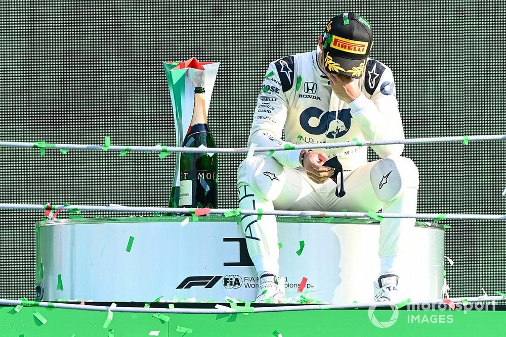 Pierre Gasly, AlphaTauri, 1st position, sits down on the podium to contemplate his victory