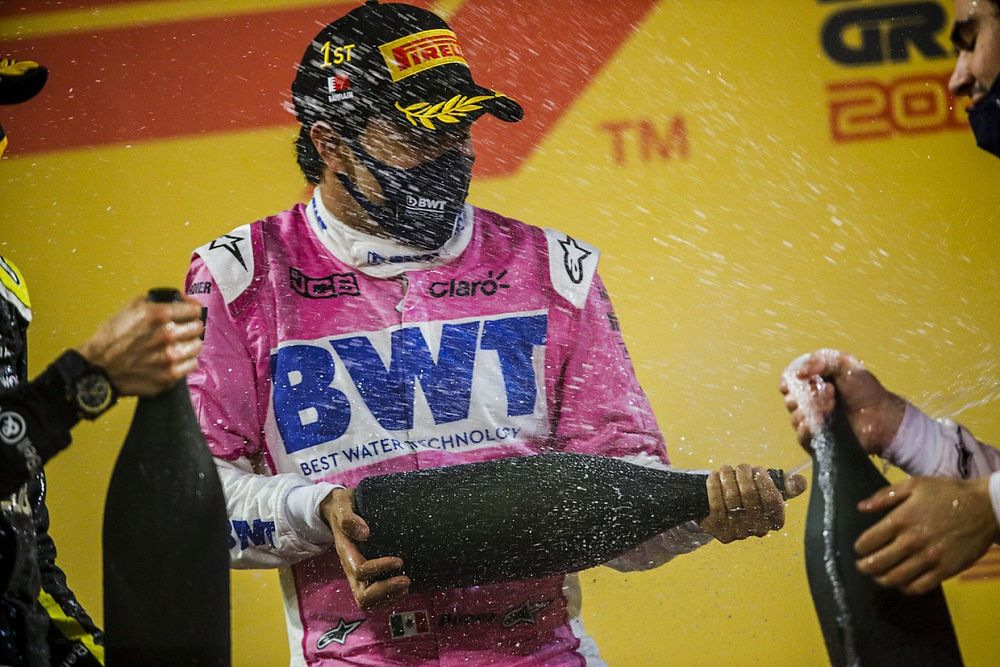 Race Winner Sergio Perez, Racing Point celebrates on the podium with the champagne