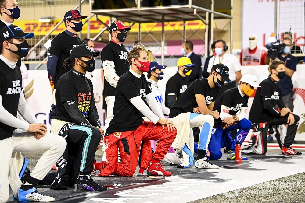 Lewis Hamilton, Mercedes-AMG F1, Sebastian Vettel, Ferrari, George Russell, Williams Racing, and the other drivers stand and kneel in support of the End Racism campaign