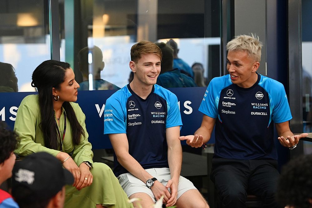 Logan Sargeant, Williams Racing, with Alex Albon, Williams Racing, speak to guests