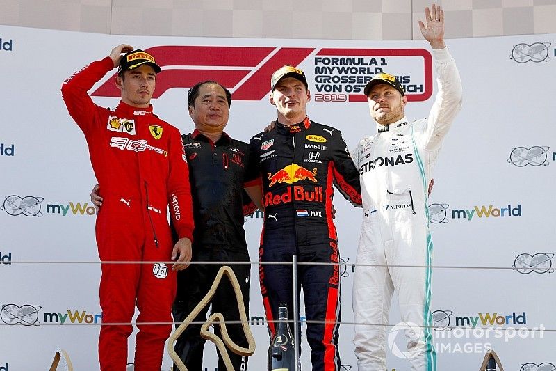 Charles Leclerc, Ferrari, Toyoharu Tanabe, F1 Technical Director, Honda, Race Winner Max Verstappen, Red Bull Racing and Valtteri Bottas, Mercedes AMG F1 celebrate on the podium