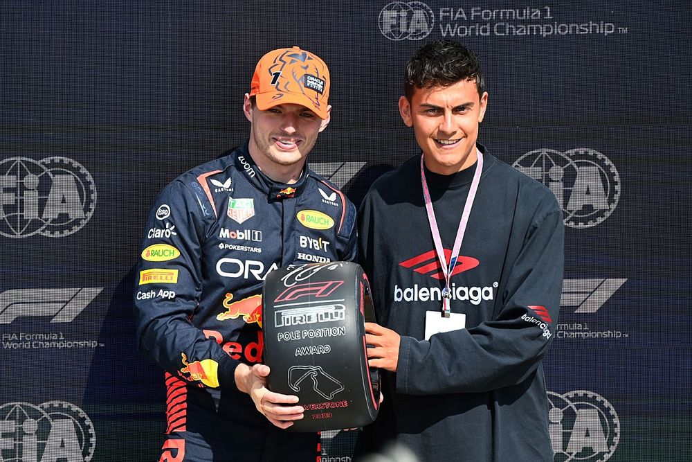 Footballer Paulo Dybala presents Max Verstappen, Red Bull Racing, with the Pirelli Pole Position Award