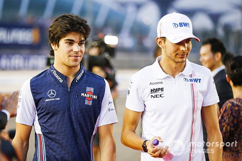 Esteban Ocon, Racing Point Force India, and Lance Stroll, Williams Racing