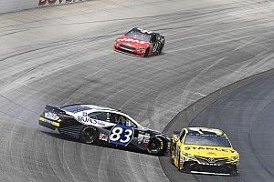 Suarez avoids carnage for career-best finish at Dover