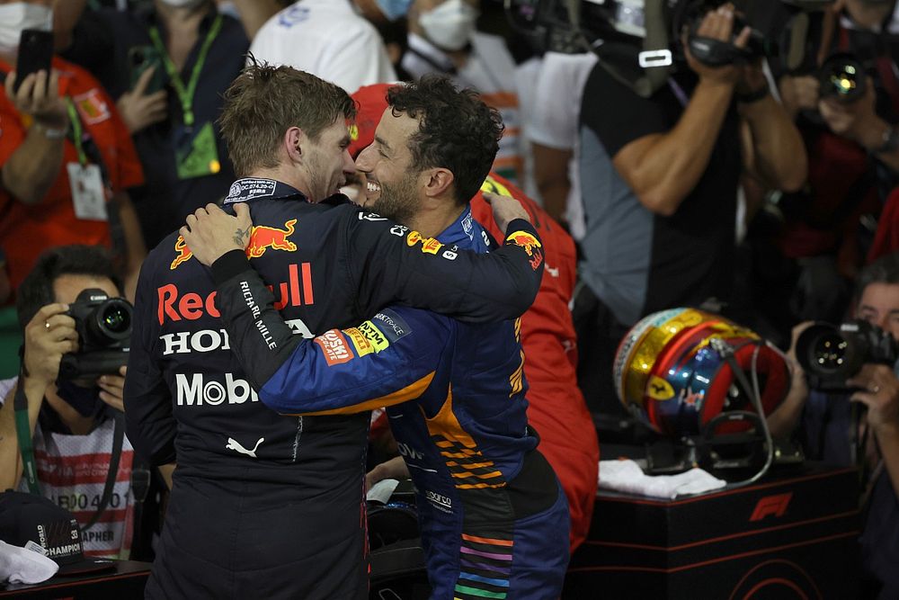 Daniel Ricciardo, McLaren, congratulates Max Verstappen, Red Bull Racing, 1st position, in Parc Ferme