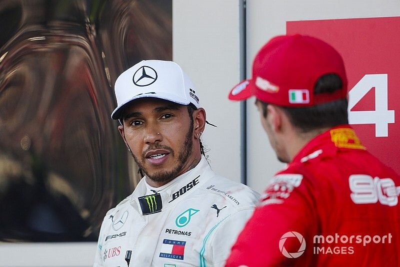 Race winner Lewis Hamilton, Mercedes AMG F1, and Charles Leclerc, Ferrari 