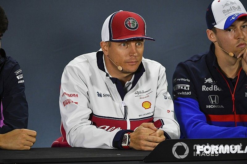 Kimi Raikkonen, Alfa Romeo Racing, and Daniil Kvyat, Toro Rosso 