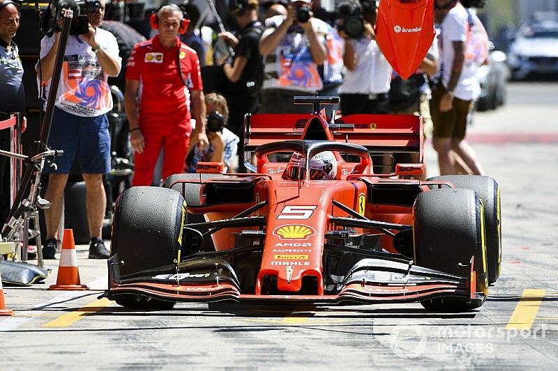 Sebastian Vettel, Ferrari SF90, in the pit lane