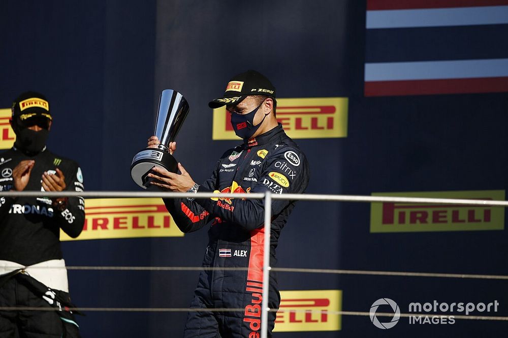 Alex Albon, Red Bull Racing, 3rd position, on the podium with his trophy