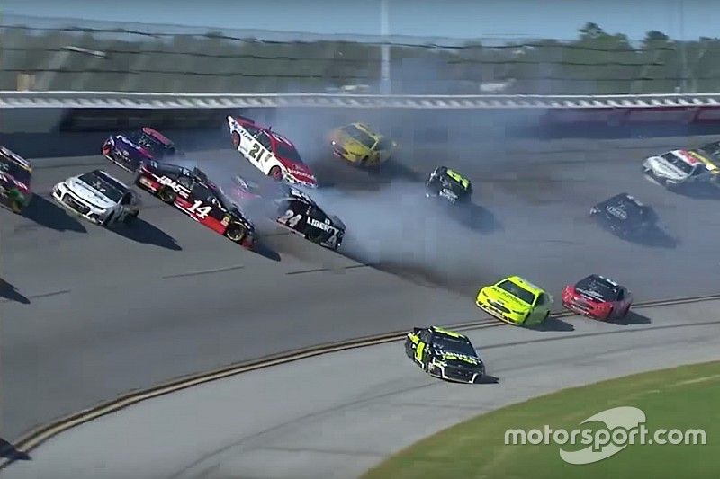 Johnson and teammate Byron collide, igniting 14-car wreck - video