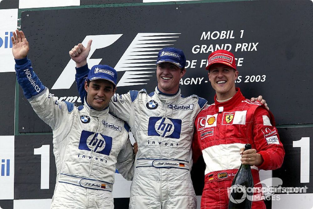 Podio: ganador de la carrera Ralf Schumacher con Juan Pablo Montoya y Michael Schumacher