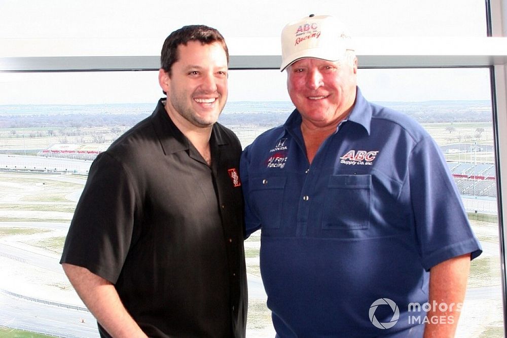 Tony Stewart and A.J. Foyt Jr. share a laugh at the Texas Motor Speedway