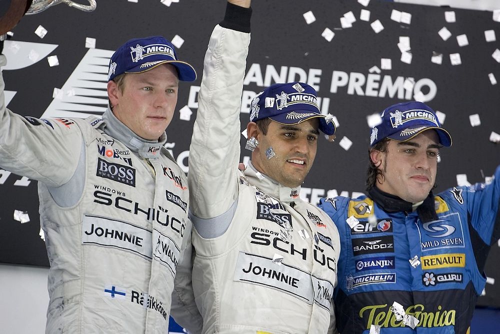 Podium: race winner Juan Pablo Montoya with Kimi Raikkonen and Fernando Alonso