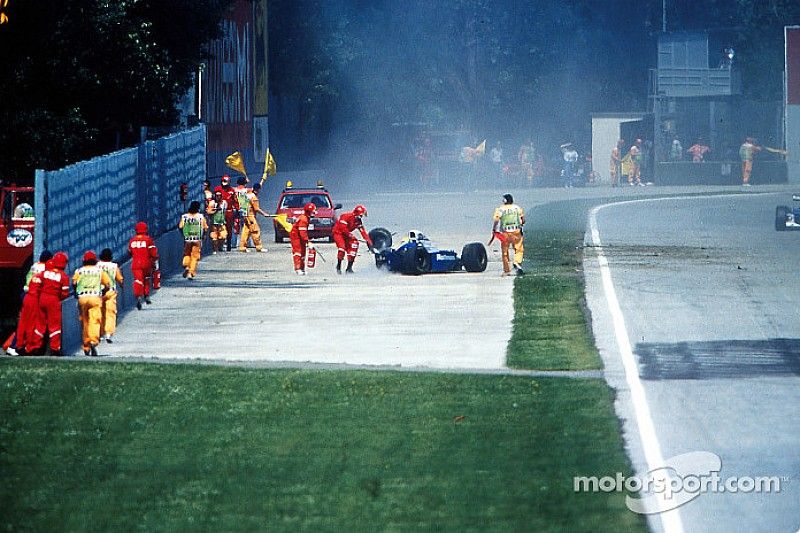 The fatal crash of Ayrton Senna at Tamburello: safety team members come to the rescue