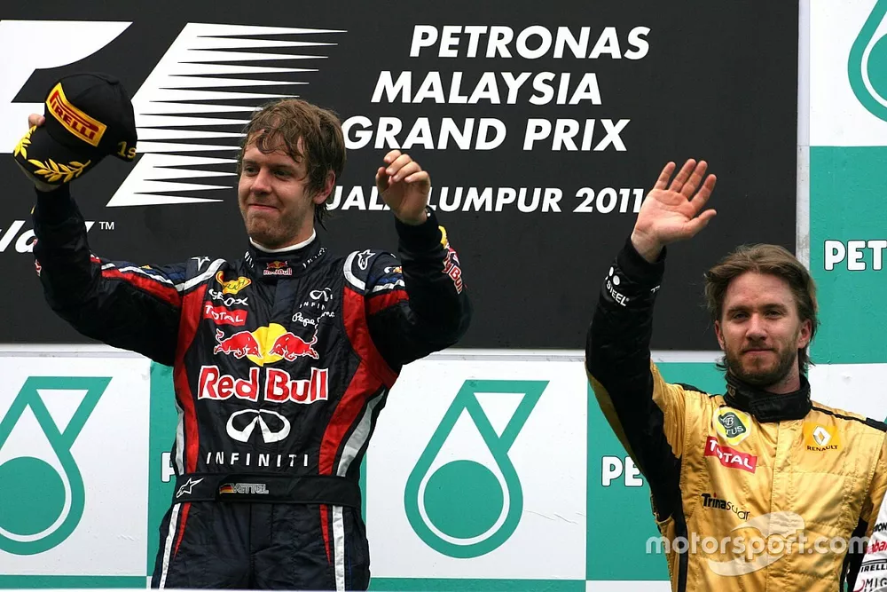 Podium: winnaar Sebastian Vettel, Red Bull Racing, 3de Nick Heidfeld, Lotus Renault F1 Team