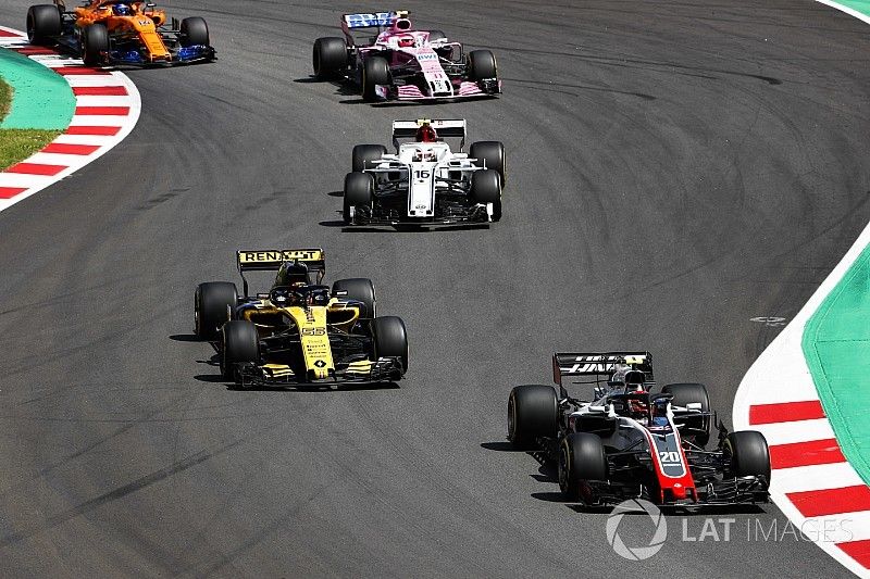 Kevin Magnussen, Haas F1 Team VF-18, Carlos Sainz Jr., Renault Sport F1 Team R.S. 18, Charles Leclerc, Sauber C37, Esteban Ocon, Force India VJM11, Fernando Alonso, McLaren MCL33