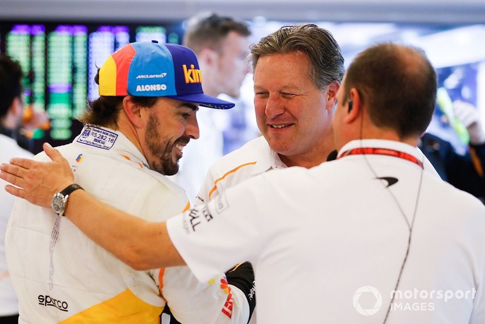 Fernando Alonso, McLaren, and Zak Brown, Executive Director, McLaren Racing, in the garage